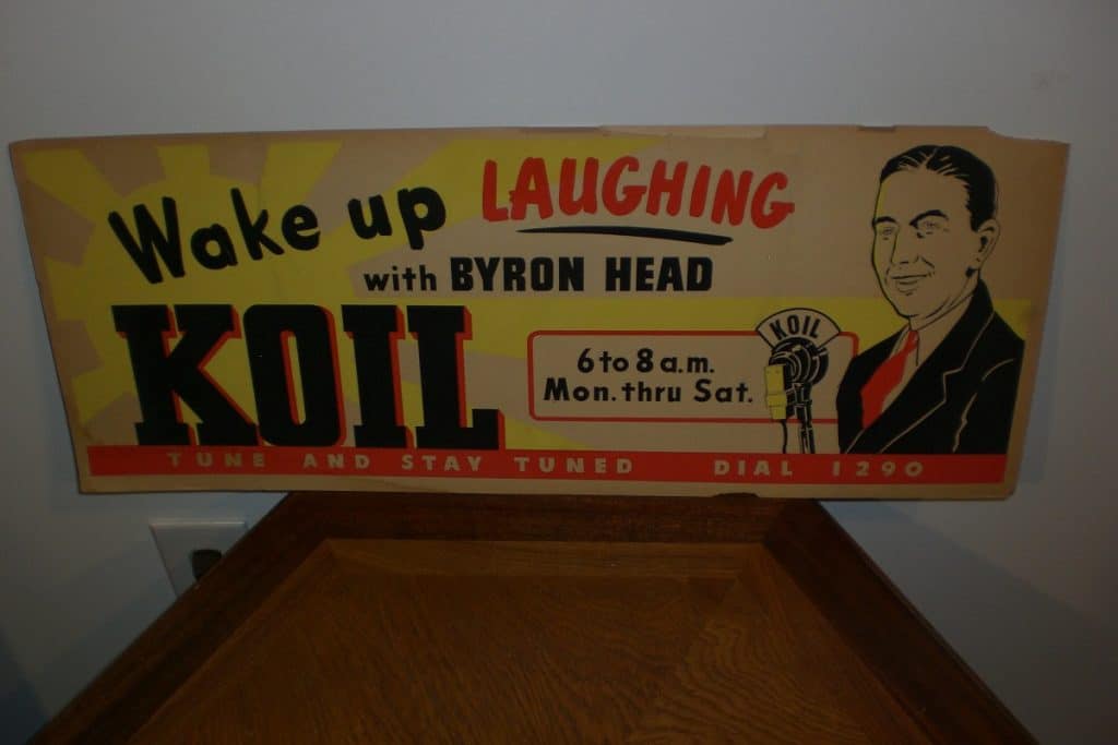 Side 1 of radio station KOIL cardboard sign